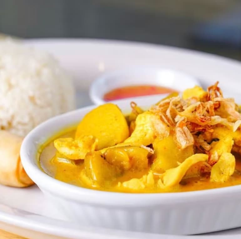 Yellow Curry with Potatoes Topped with Crispy Shallots